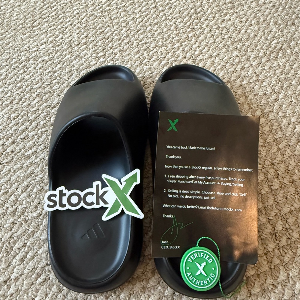 brand new black size 11 yeezy slides